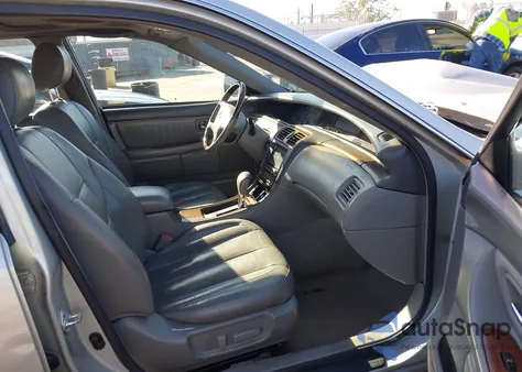 2003 Toyota Avalon Xls z USA, uszkodzony, nr VIN 4T1BF28B23U334838